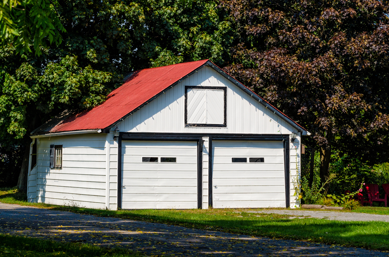 White painted, detached, two-car garage