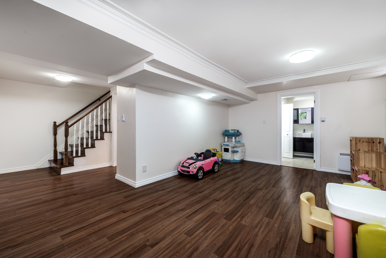Beautiful wood flooring in a remodeled basement